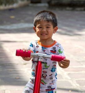 toddler-on-red-scooter